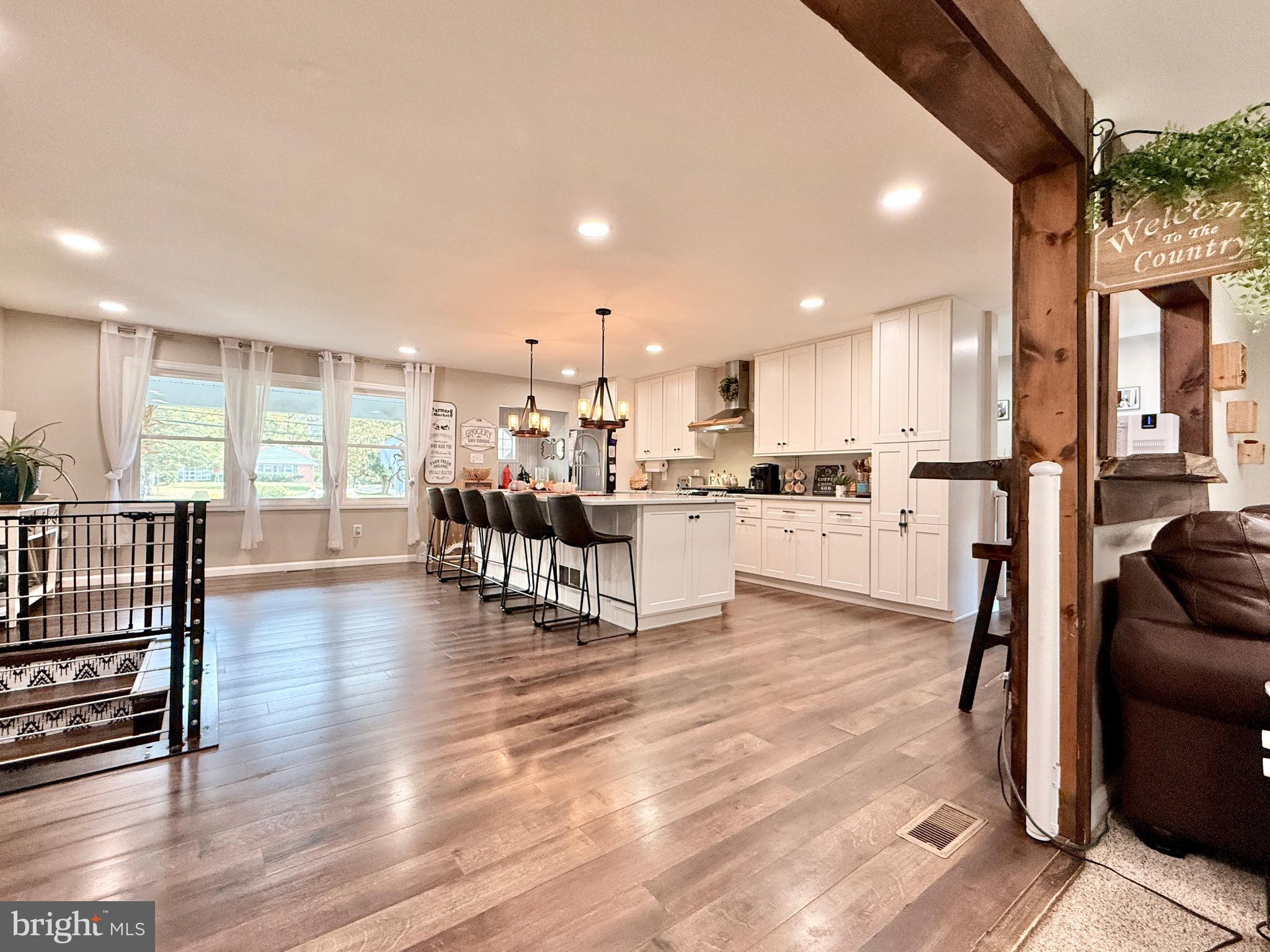 1325 Janvier Road Williamstown, NJ 08094 - Photo 2 of 32 a living room with furniture and kitchen view with wooden floor