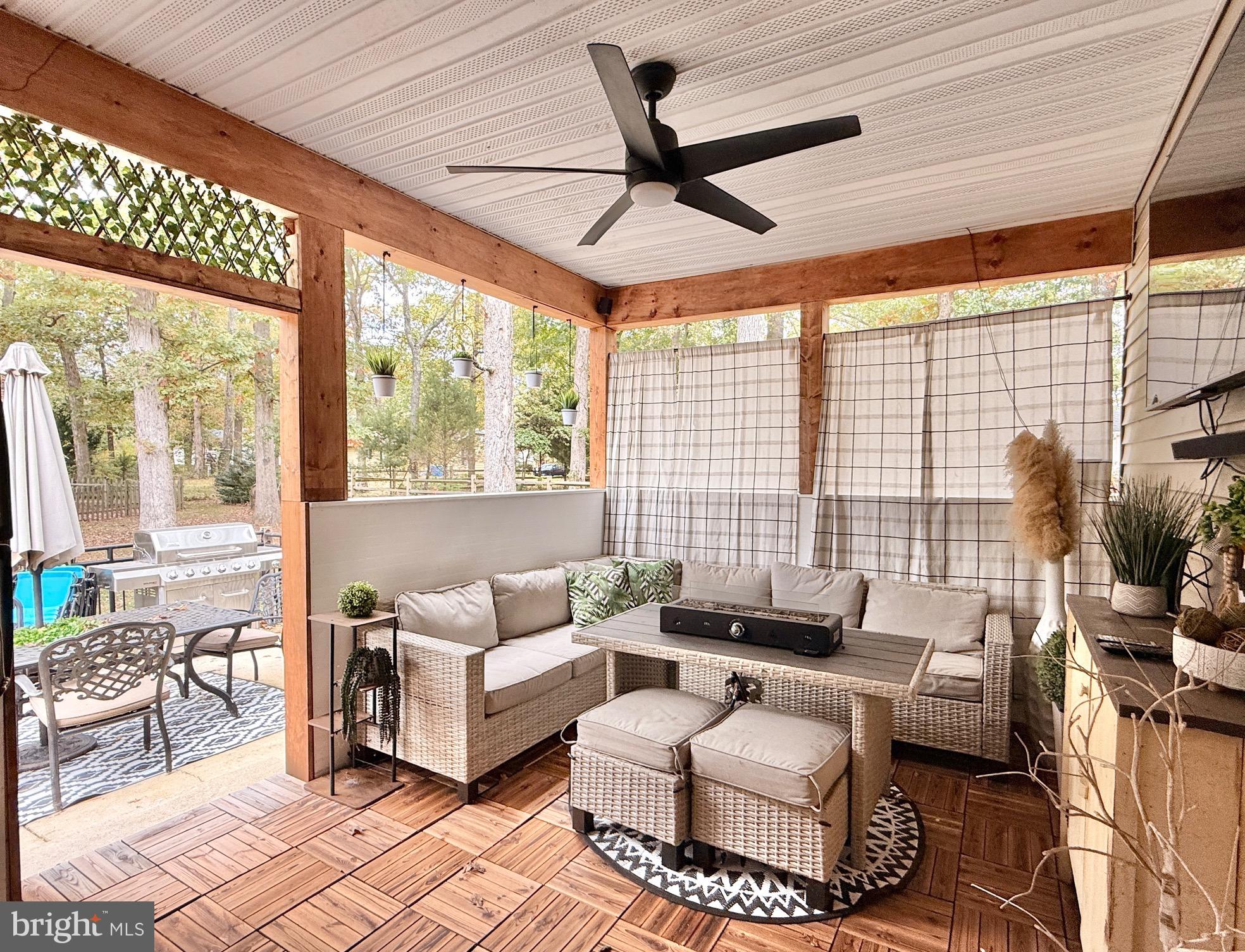1325 Janvier Road Williamstown, NJ 08094 - Photo 25 of 32 a living room with patio furniture and a large window