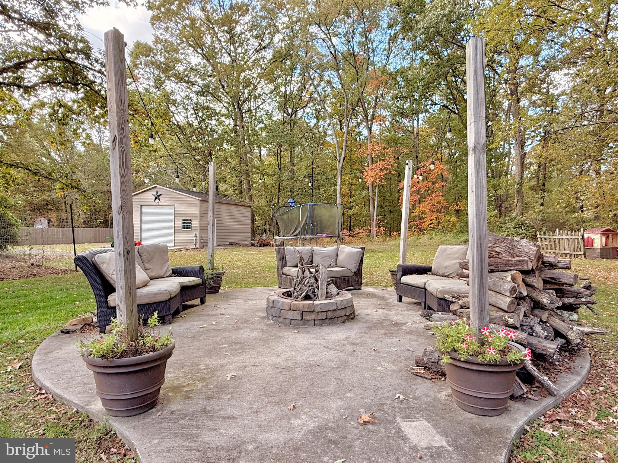 1325 Janvier Road Williamstown, NJ 08094 - Photo 30 of 32 a view of a patio with chairs and a potted plant