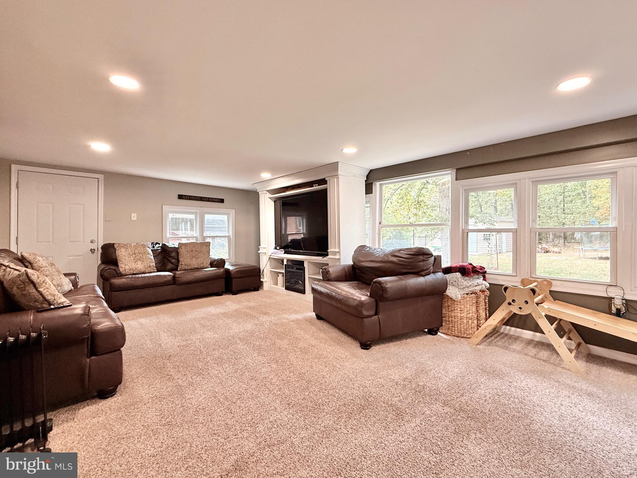 1325 Janvier Road Williamstown, NJ 08094 - Photo 7 of 32 a living room with furniture and a large window