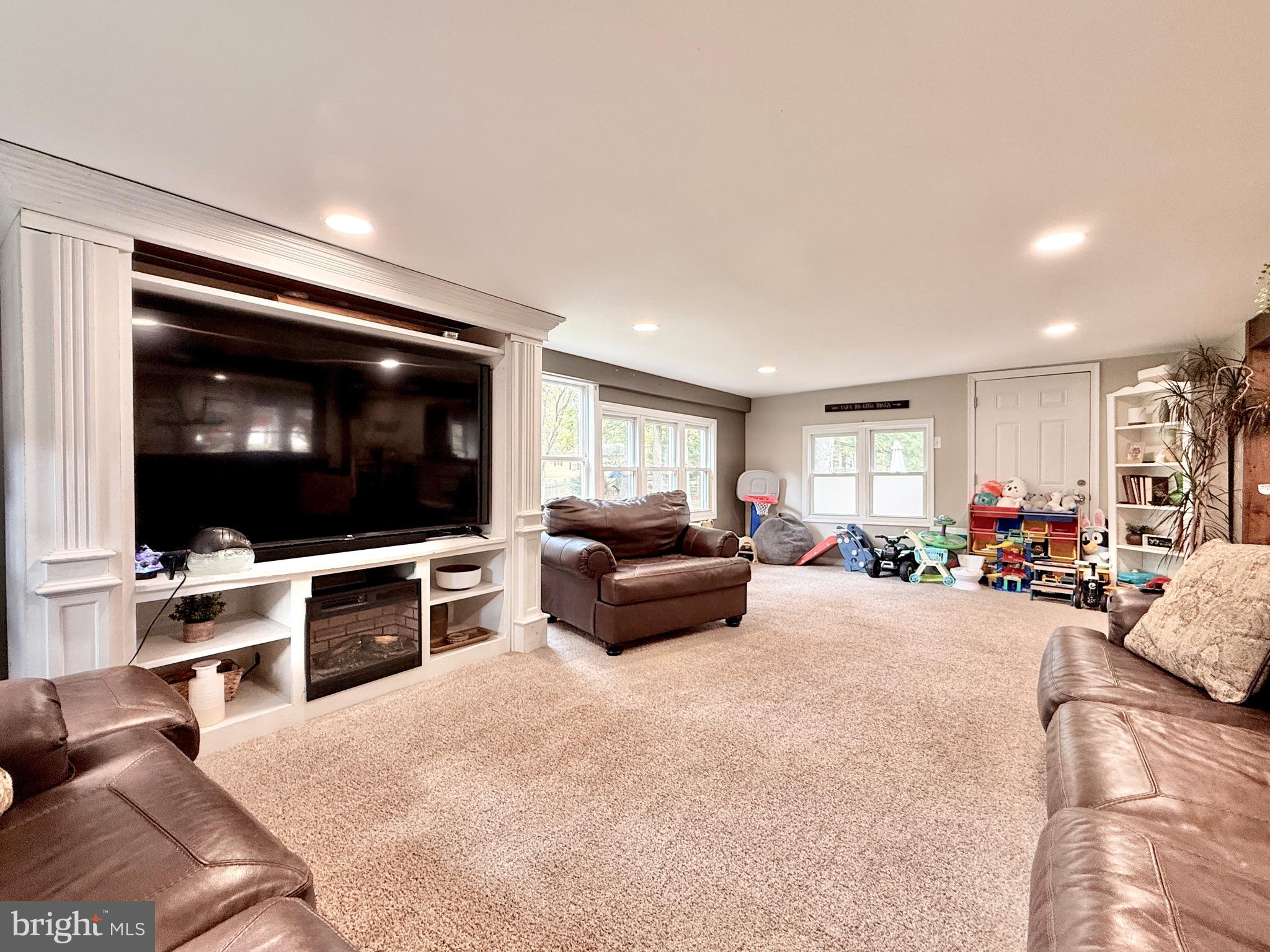 1325 Janvier Road Williamstown, NJ 08094 - Photo 8 of 32 a living room with furniture and a flat screen tv