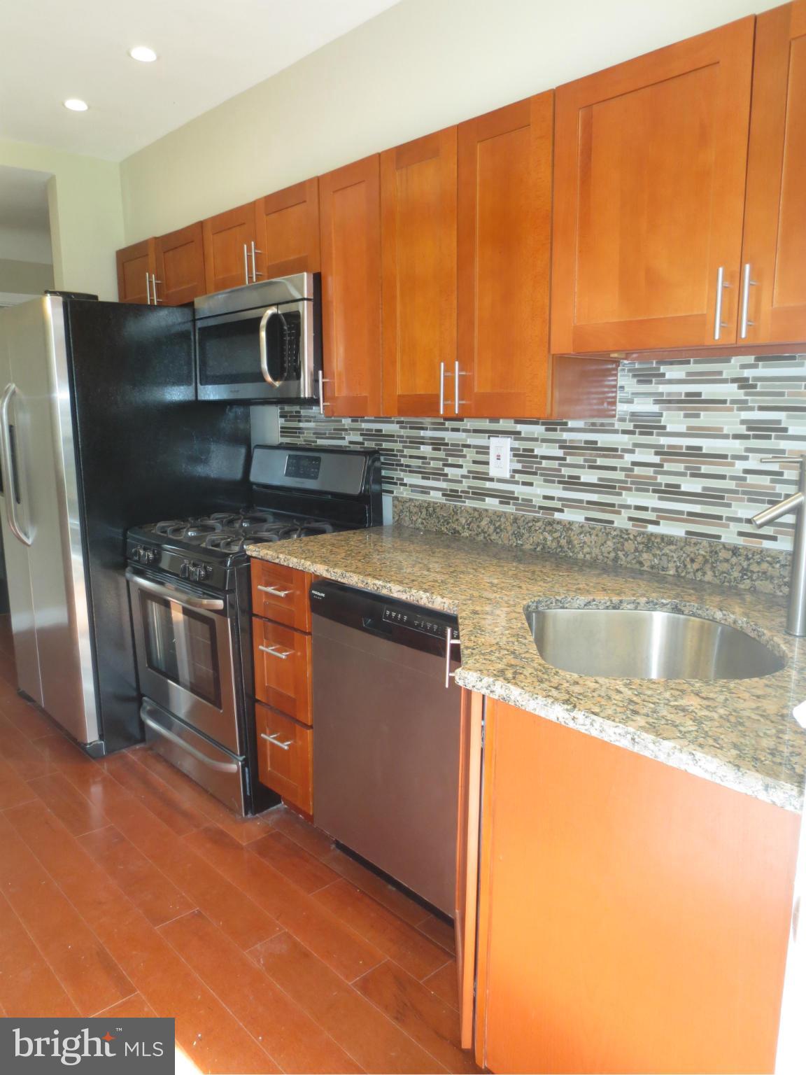 1503 Gleneagle Road Baltimore, MD 21239 - Photo 14 of 26 Long Kitchen