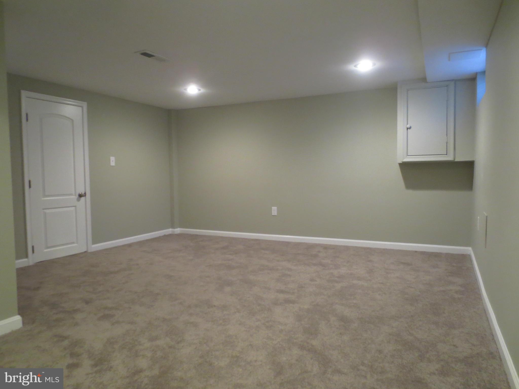 1503 Gleneagle Road Baltimore, MD 21239 - Photo 16 of 26 Basement Family Room
