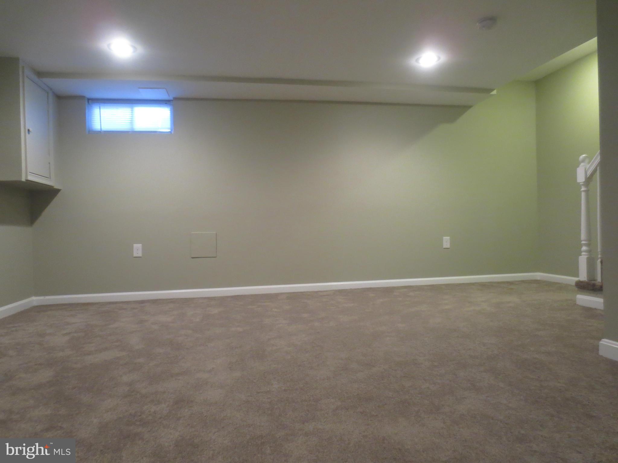 1503 Gleneagle Road Baltimore, MD 21239 - Photo 17 of 26 Large Basement Family Room