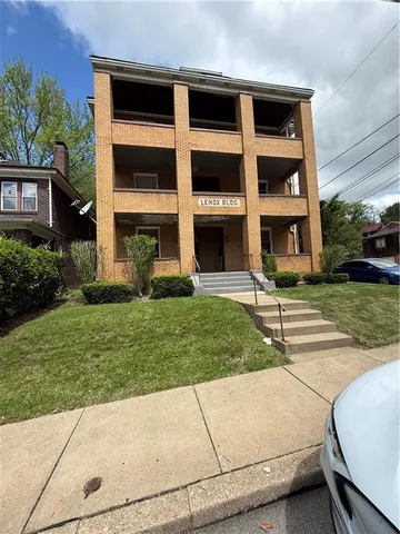 a house view with a garden space