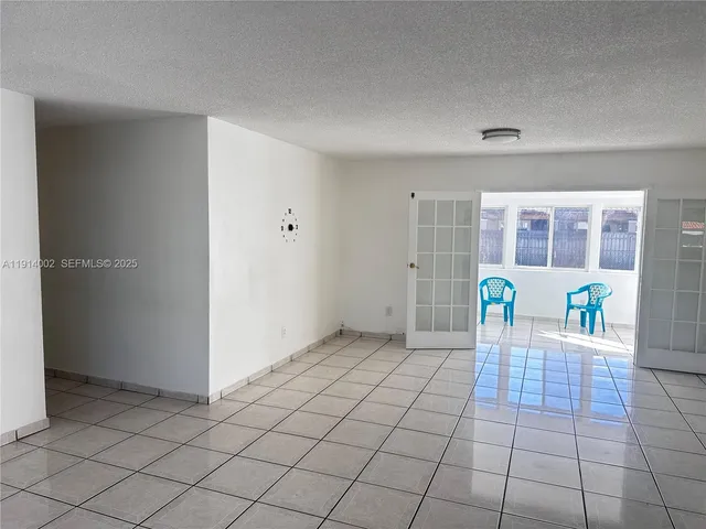 a view of a storage & utility room with windows