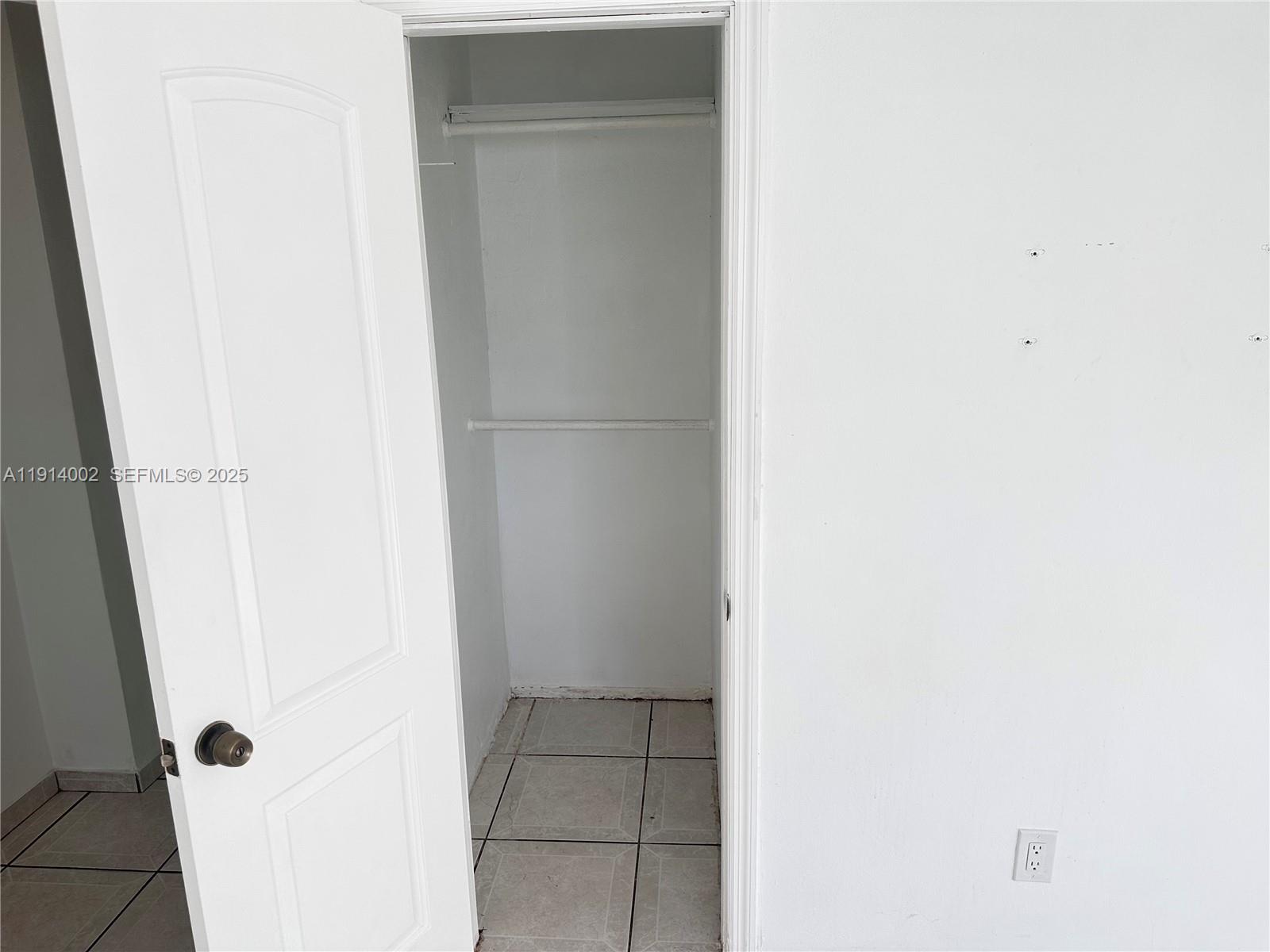 2914 Southwest 92nd Court Miami, FL 33165 - Photo 23 of 37 a bathroom with a granite countertop shower and a sink