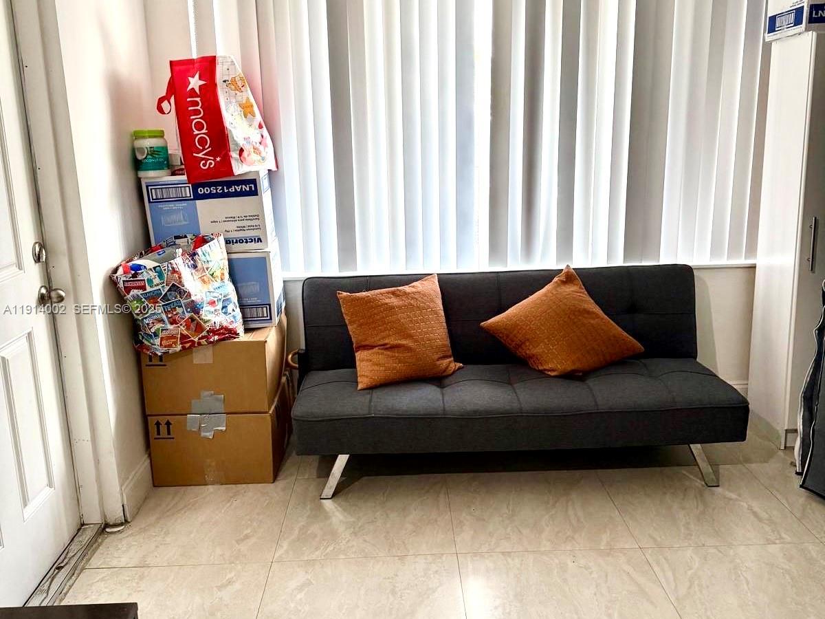 2914 Southwest 92nd Court Miami, FL 33165 - Photo 27 of 37 a living room with furniture and a couch