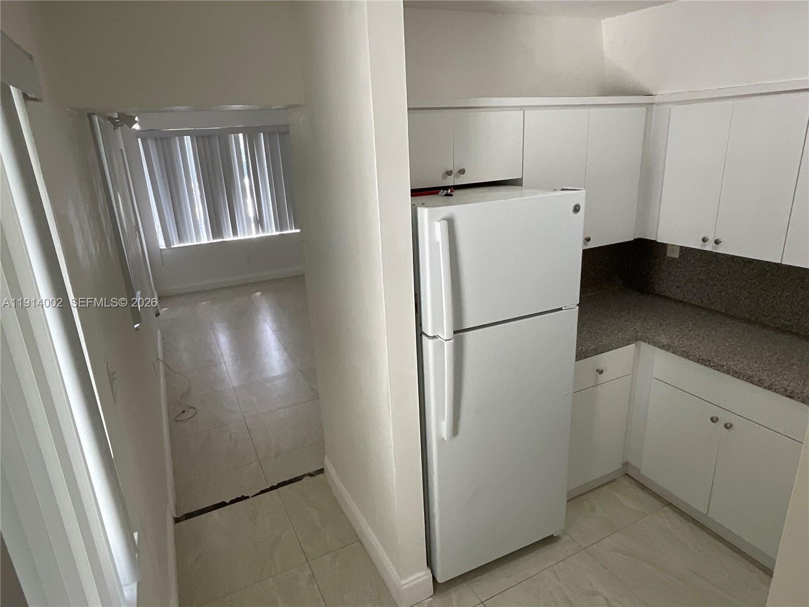 2914 Southwest 92nd Court Miami, FL 33165 - Photo 29 of 39 a view of kitchen with wooden floor