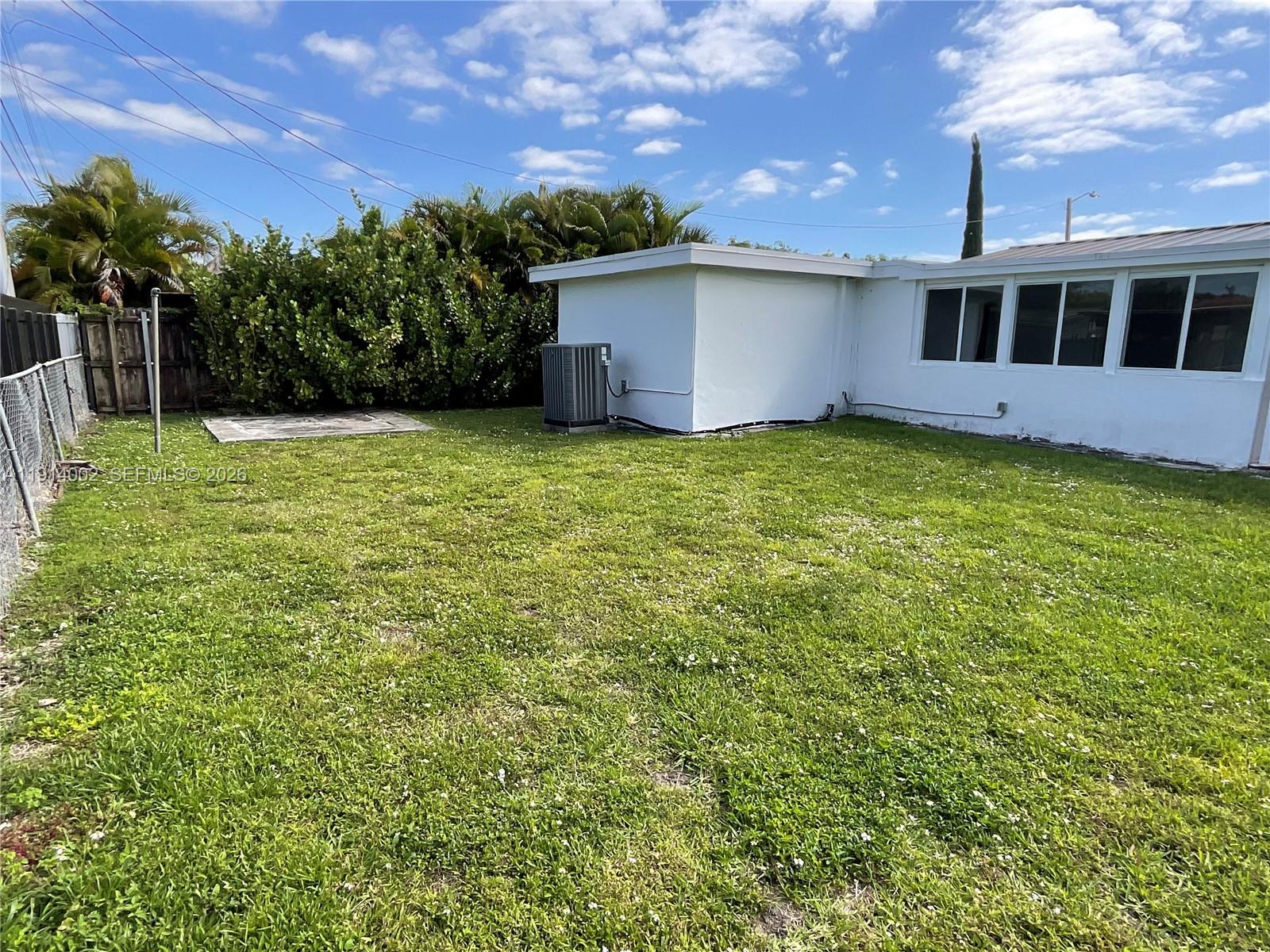 2914 Southwest 92nd Court Miami, FL 33165 - Photo 37 of 39 a view of a house with a backyard