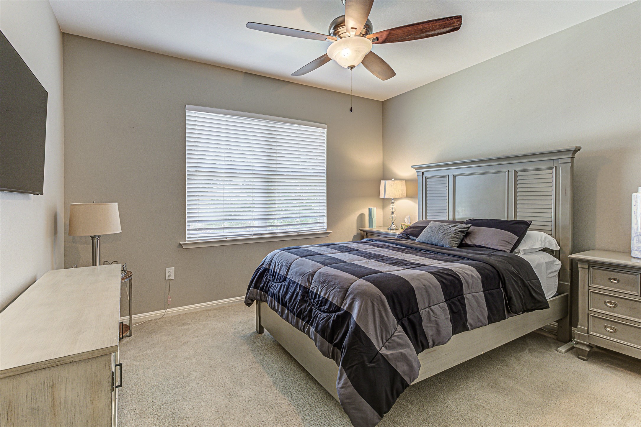 4809 Bolm Road Austin, TX 78702 - Photo 18 of 29 a bedroom with a bed and window