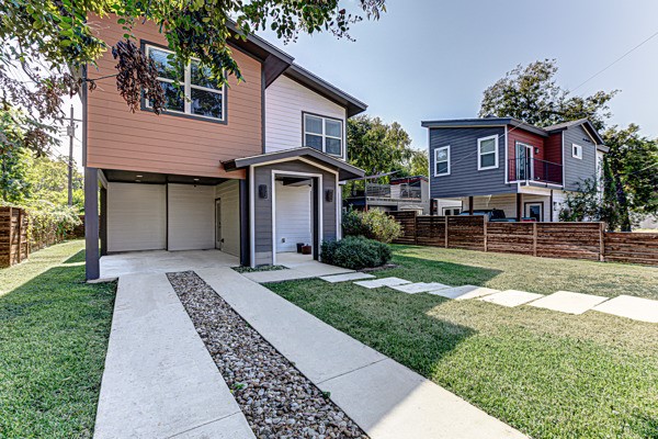 4809 Bolm Road Austin, TX 78702 - Photo 3 of 29 a front view of a house with garden