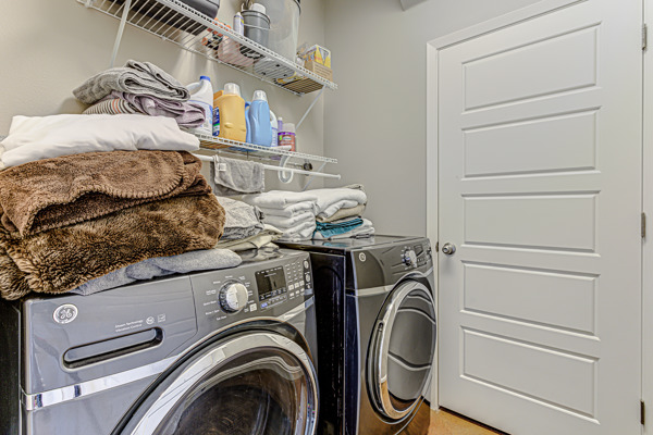 4809 Bolm Road Austin, TX 78702 - Photo 7 of 29 a utility room with dryer and washer