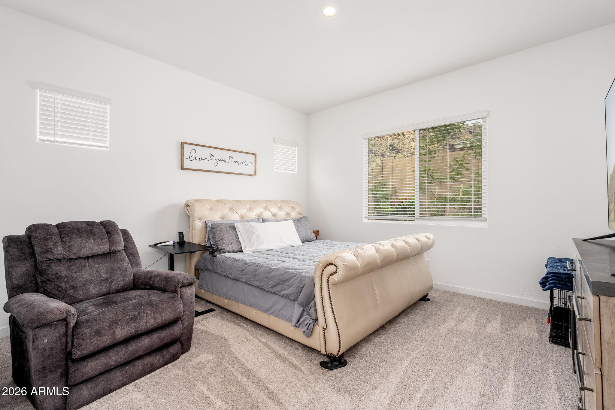 3272 West Peak View Road Phoenix, AZ 85083 - Photo 11 of 47 a living room with a couch and a window