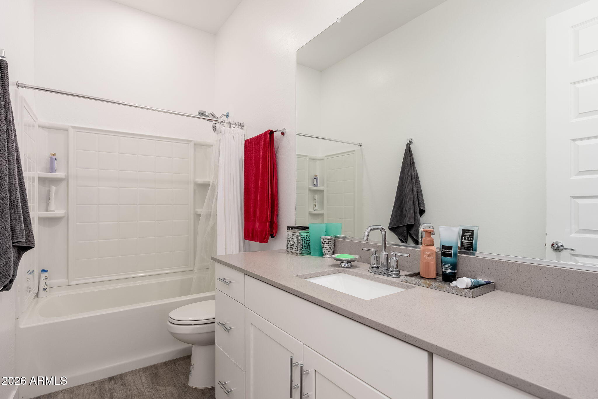3272 West Peak View Road Phoenix, AZ 85083 - Photo 18 of 47 a bathroom with a sink a toilet and a tub