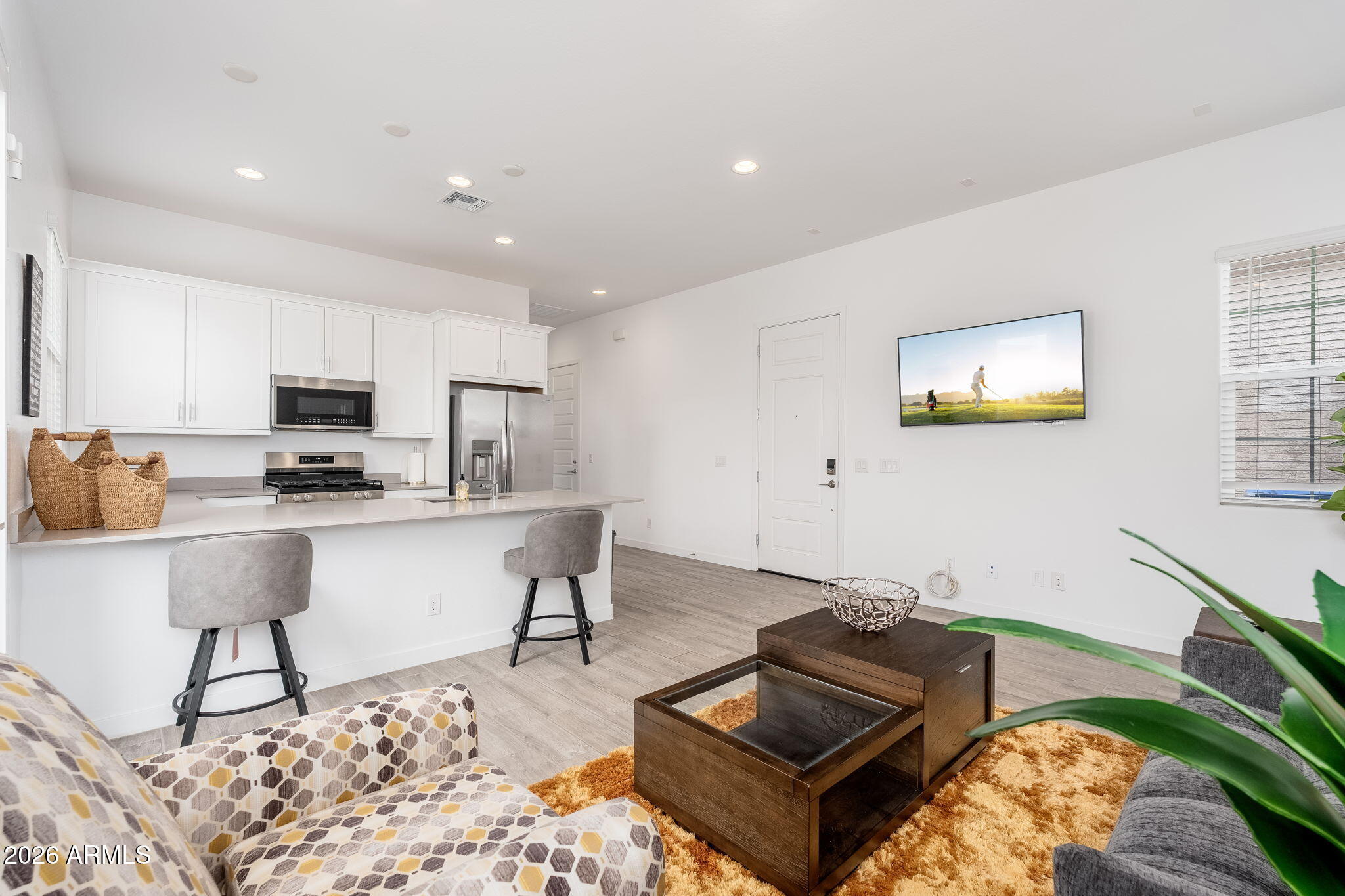 3272 West Peak View Road Phoenix, AZ 85083 - Photo 23 of 47 a living room with furniture and a flat screen tv