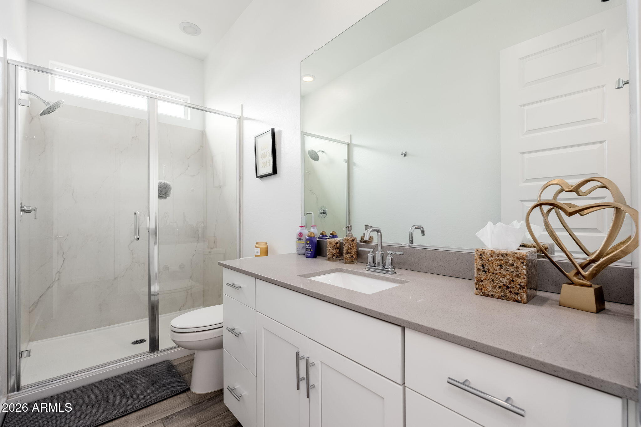 3272 West Peak View Road Phoenix, AZ 85083 - Photo 27 of 47 a bathroom with a sink and a mirror