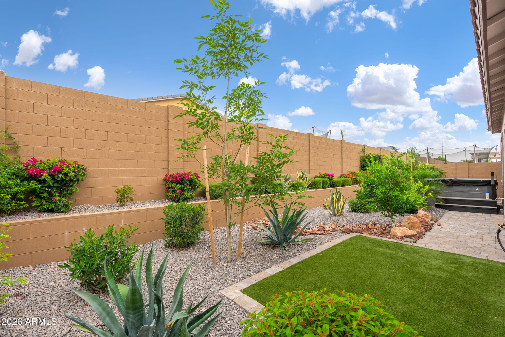 3272 West Peak View Road Phoenix, AZ 85083 - Photo 32 of 47 a view of a backyard with a garden