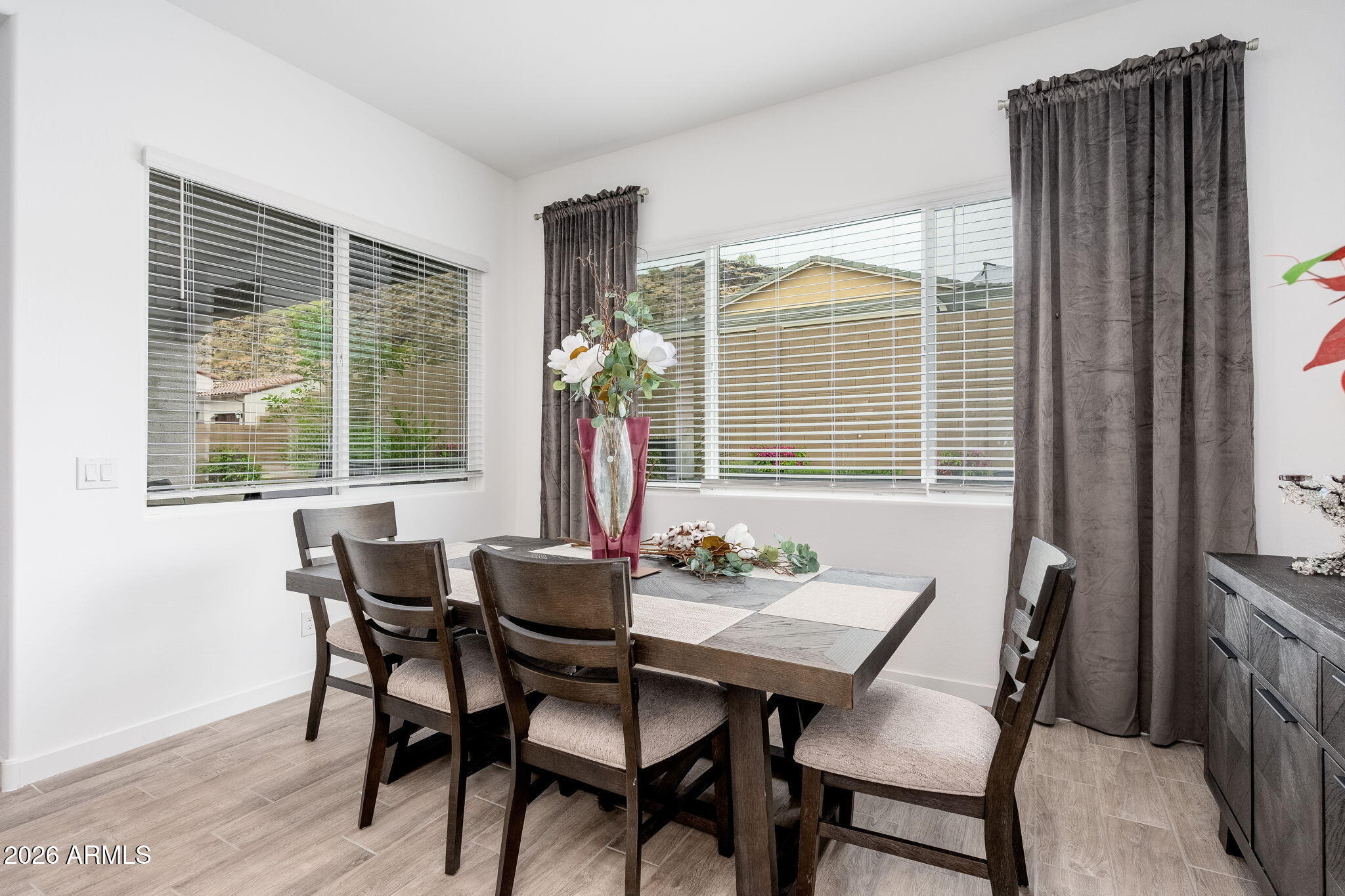 3272 West Peak View Road Phoenix, AZ 85083 - Photo 9 of 47 a dining room with furniture and window