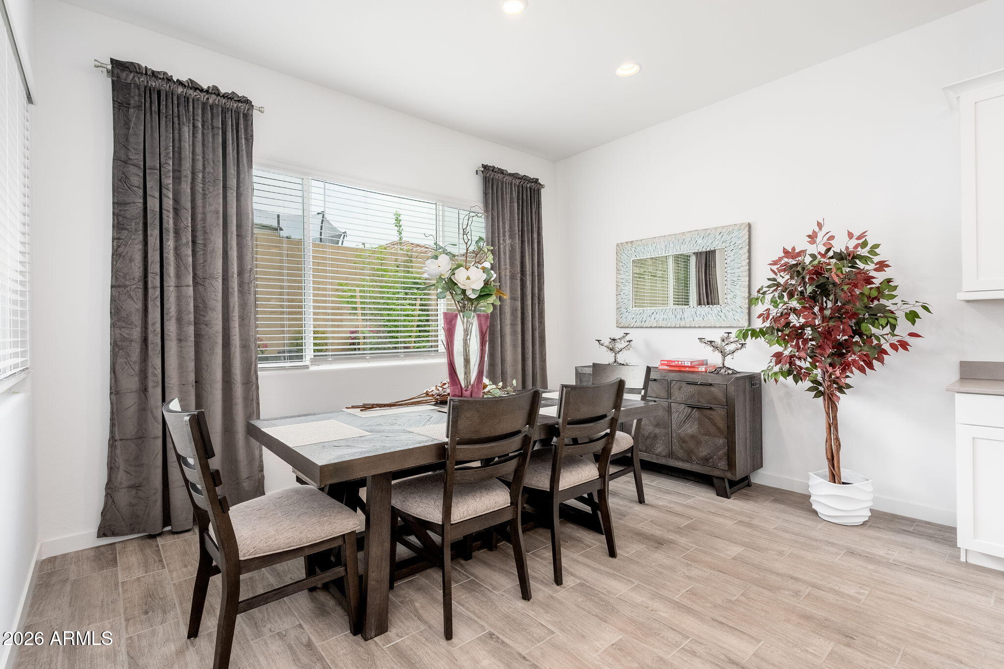3272 West Peak View Road Phoenix, AZ 85083 - Photo 10 of 47 a dining room with furniture and window
