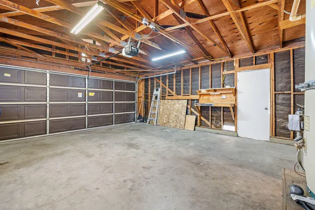 a view of a room with wooden shelves