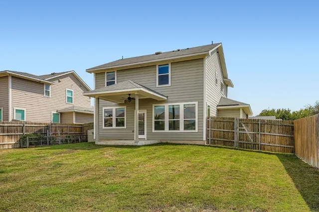 a view of house with garage