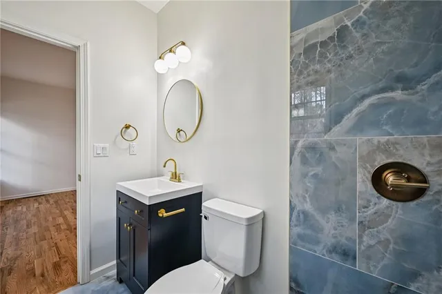 a backyard of a house with a yard and outdoor seating