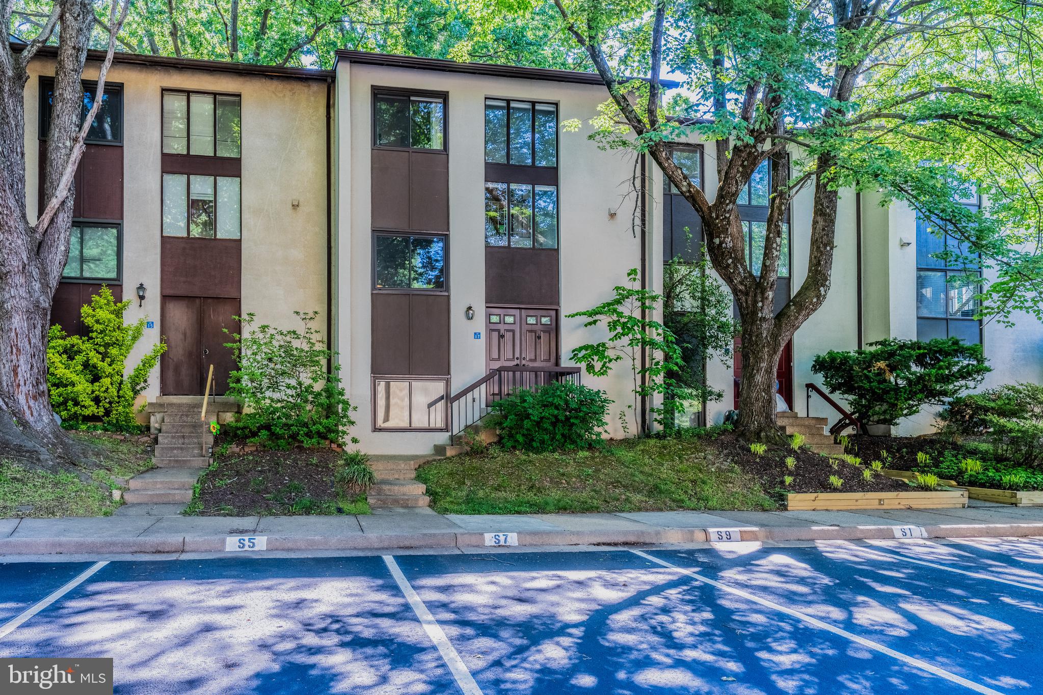 11917 Barrel Cooper Court Reston, VA 20191 - Photo 54 of 59 a front view of a house with garden