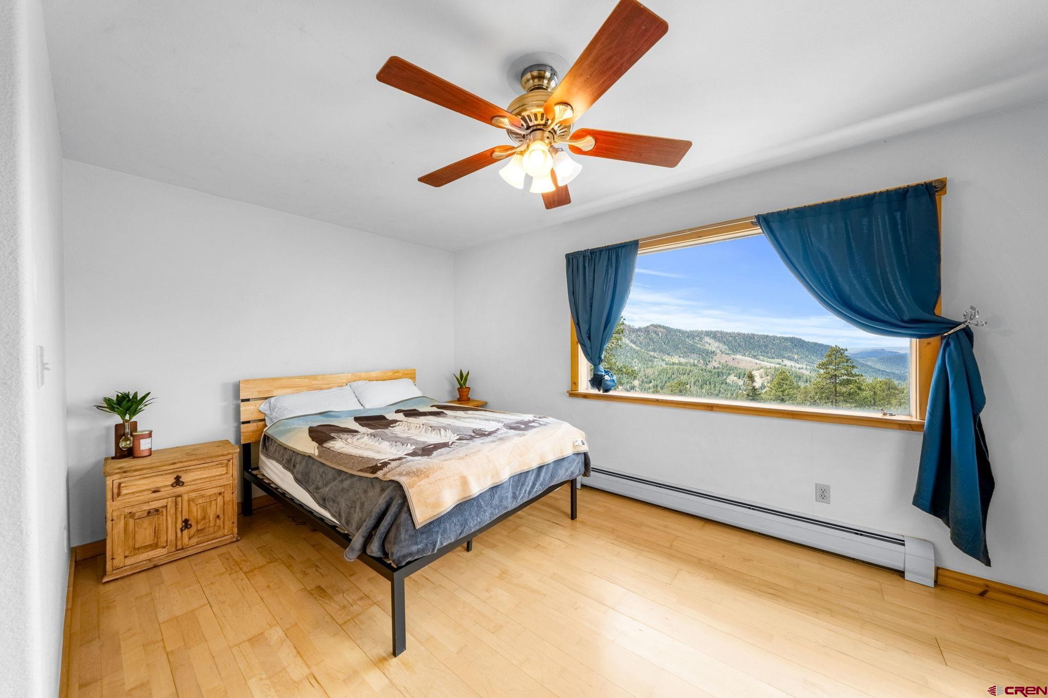 151 Sunny Lane Durango, CO 81301 - Photo 26 of 35 a bedroom with a bed and window