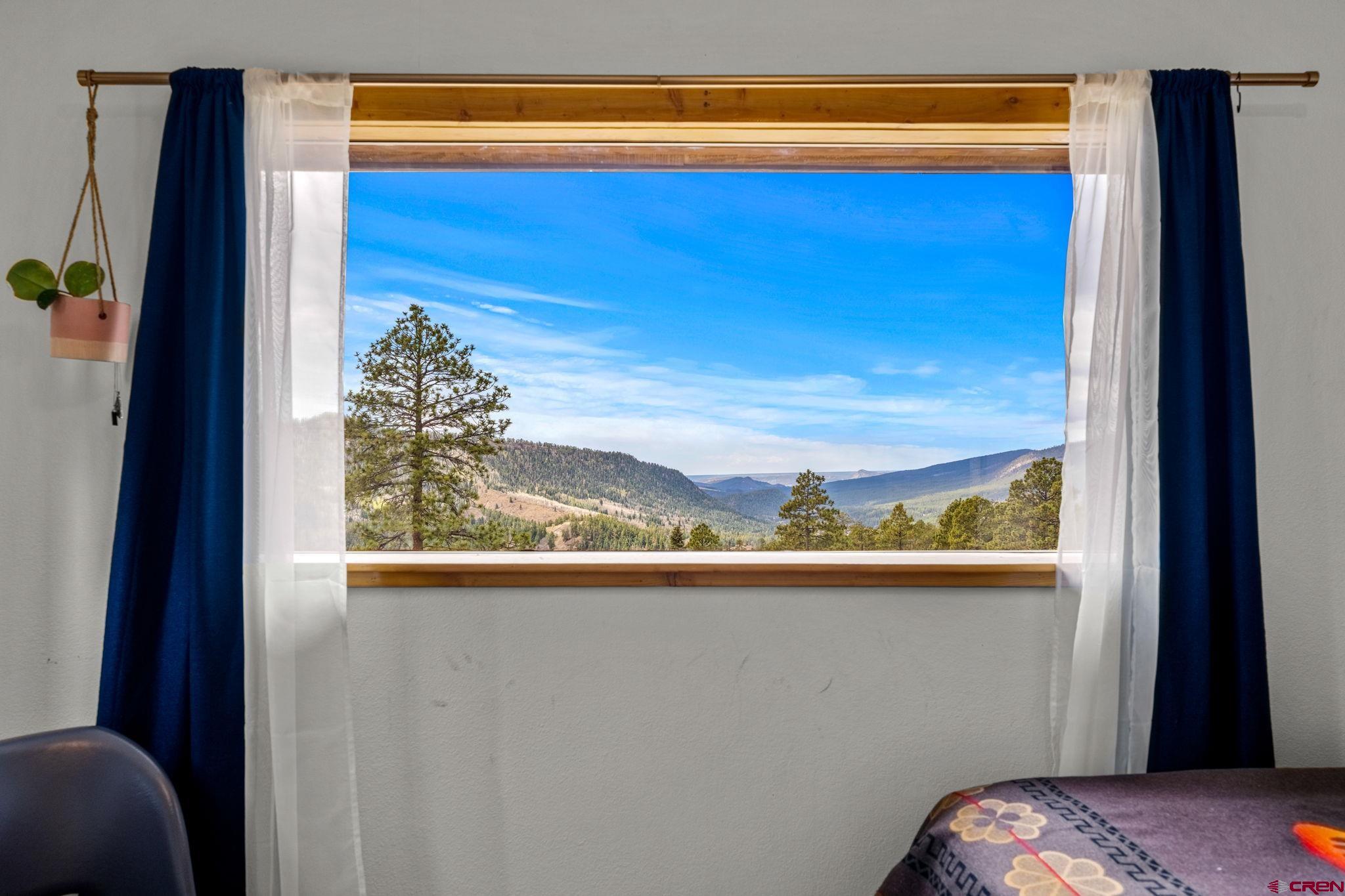 151 Sunny Lane Durango, CO 81301 - Photo 30 of 35 a view of a window in a bedroom