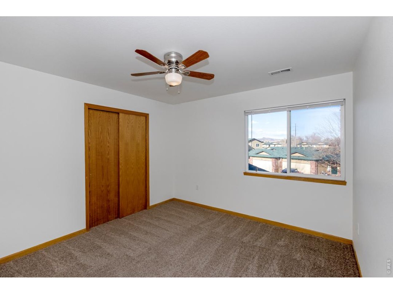850 South Overland Trail, Unit 26 Fort Collins, CO 80521 - Photo 25 of 36 a view of an empty room and window