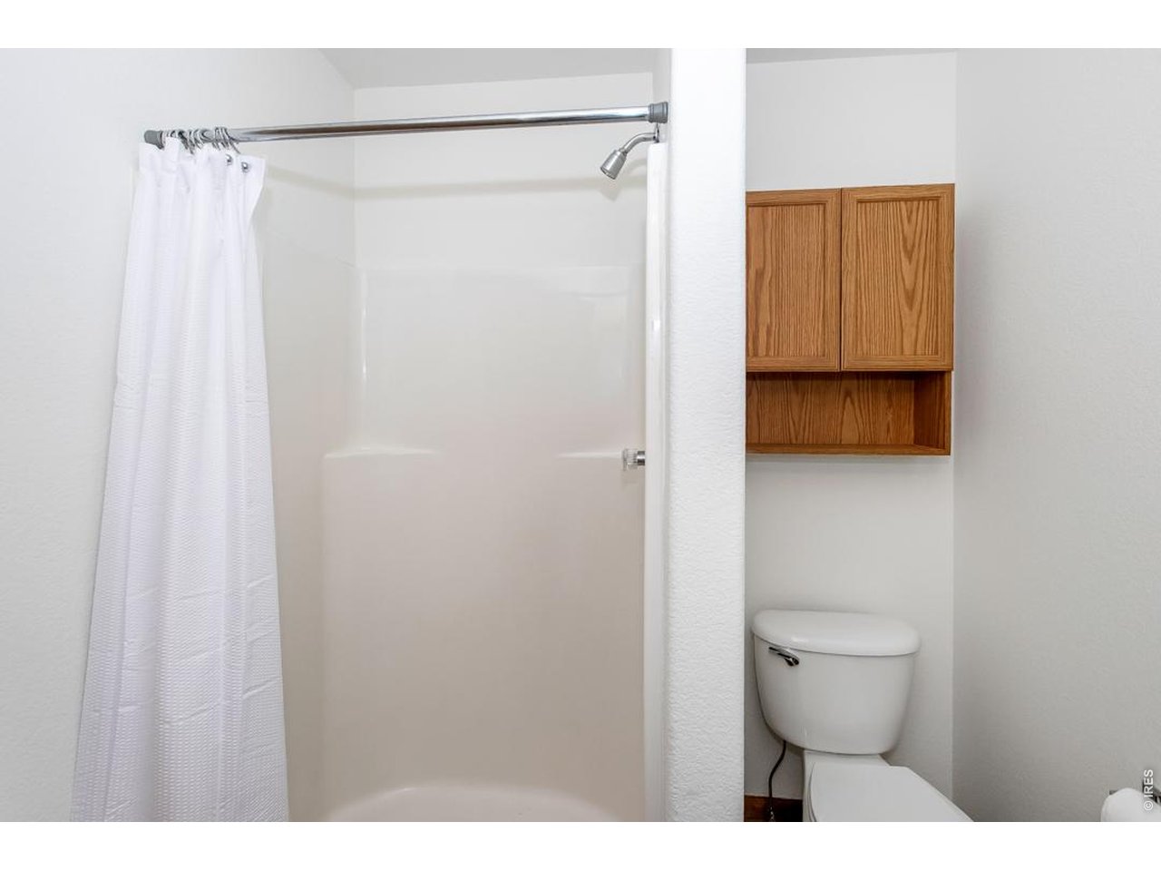 850 South Overland Trail, Unit 26 Fort Collins, CO 80521 - Photo 27 of 36 a bathroom with a shower and a toilet