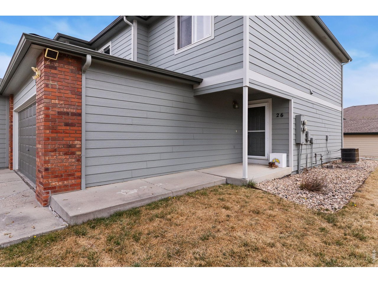 850 South Overland Trail, Unit 26 Fort Collins, CO 80521 - Photo 36 of 36 a view of a house with a yard