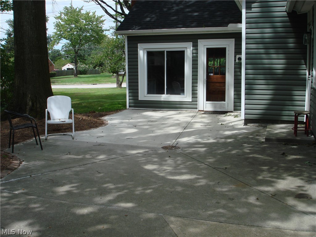919 Richmond Road Cleveland, OH 44124 - Photo 4 of 35 Newly releveled and restored concrete patio with drainage offers a wonderful retreat for your family to enjoy in warmer months! Great for family gatherings!