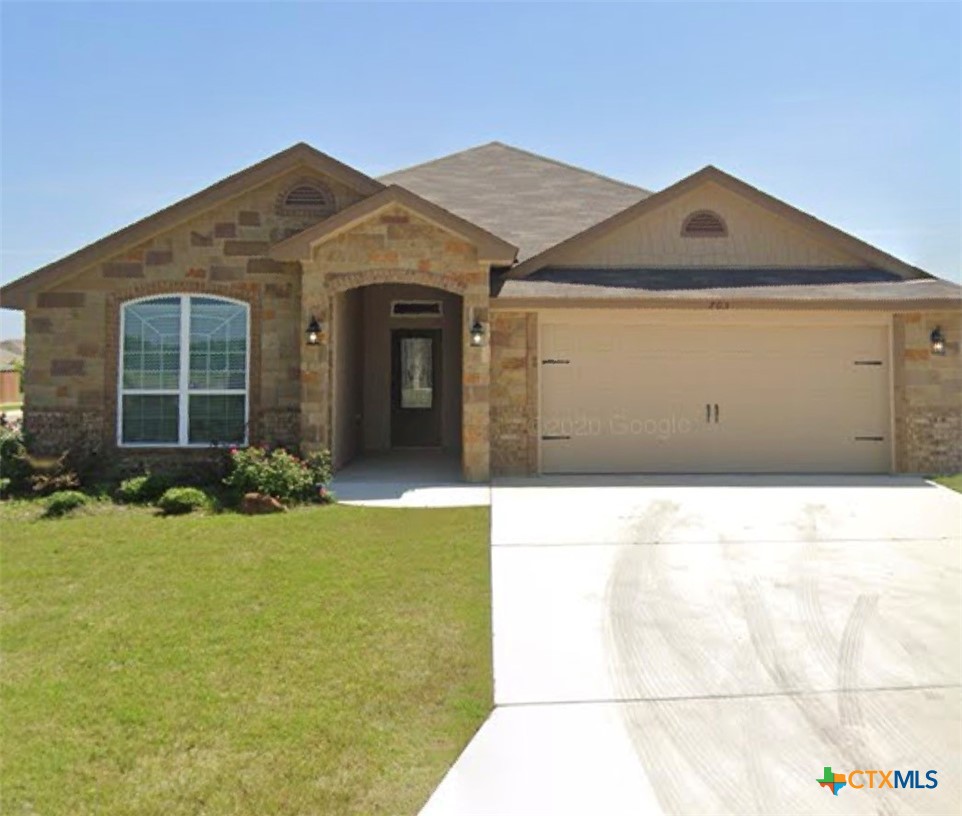 703 Ridgeview Drive Temple, TX 76502 - Photo 2 of 5 a front view of a house with a yard