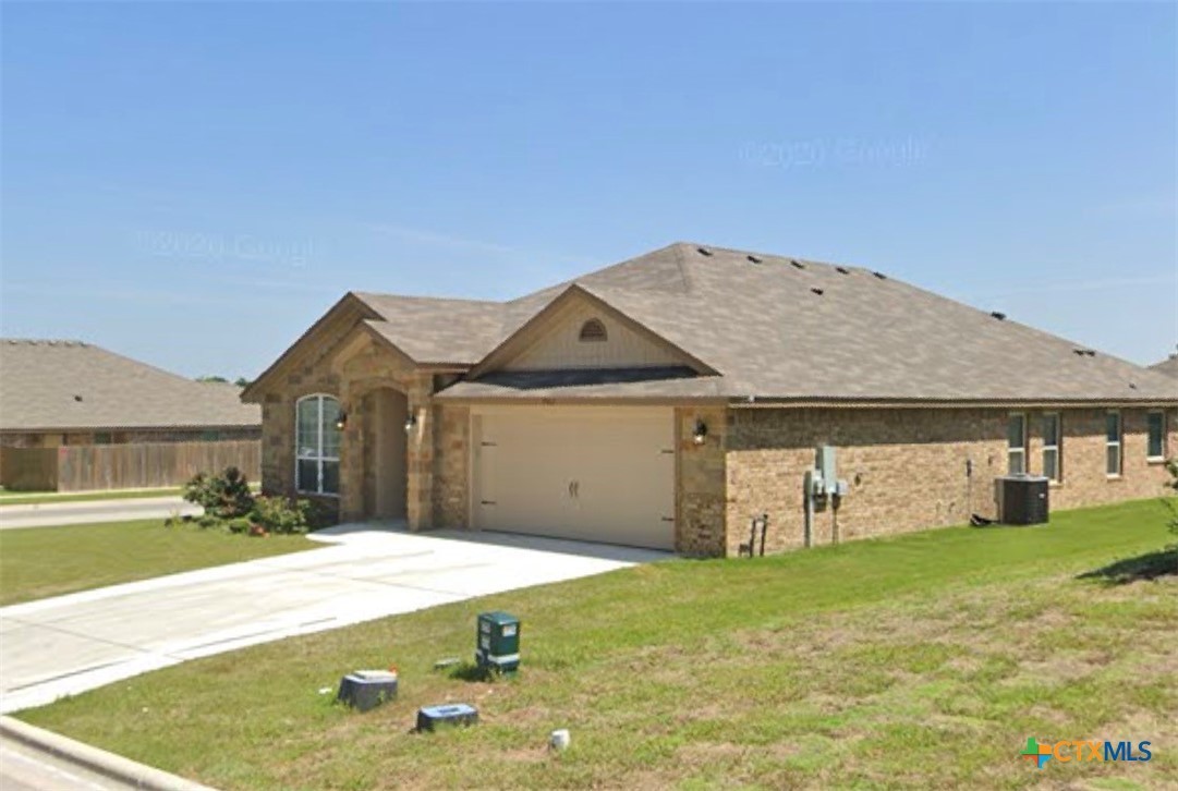 703 Ridgeview Drive Temple, TX 76502 - Photo 5 of 5 a front view of a house with garden