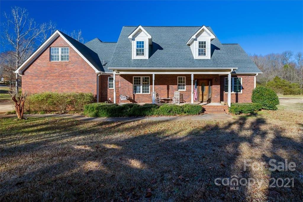 4503 Davis Road Edgemoor, SC 29712 - Photo 1 of 21 a front view of a house with a yard
