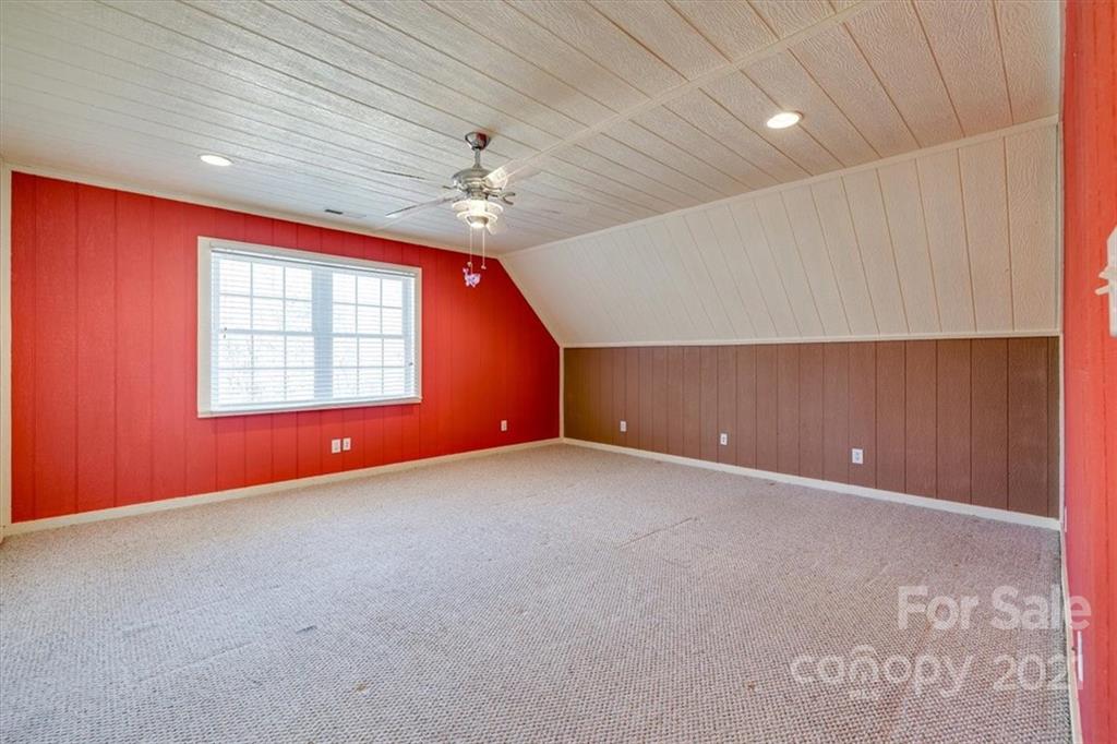 4503 Davis Road Edgemoor, SC 29712 - Photo 15 of 21 an empty room with windows and ceiling fan
