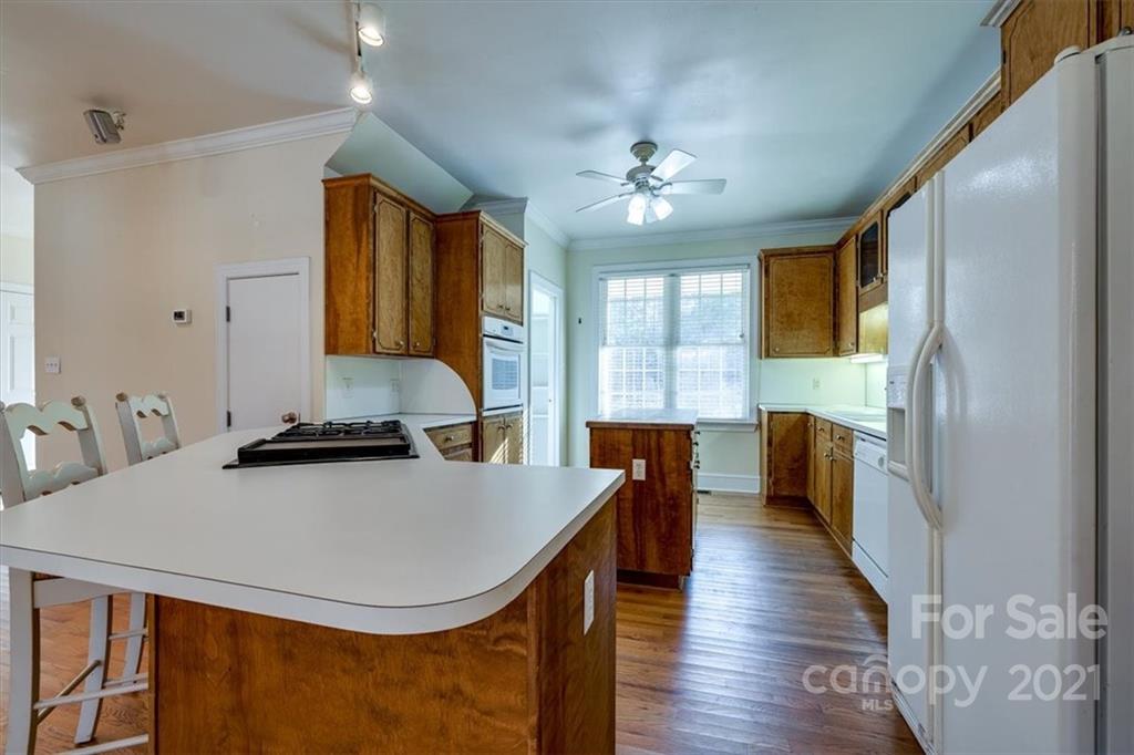 4503 Davis Road Edgemoor, SC 29712 - Photo 8 of 21 a view of a kitchen from a dining room