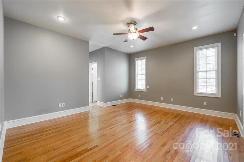 4503 Davis Road Edgemoor, SC 29712 - Photo 10 of 21 a view of an empty room with wooden floor and a window