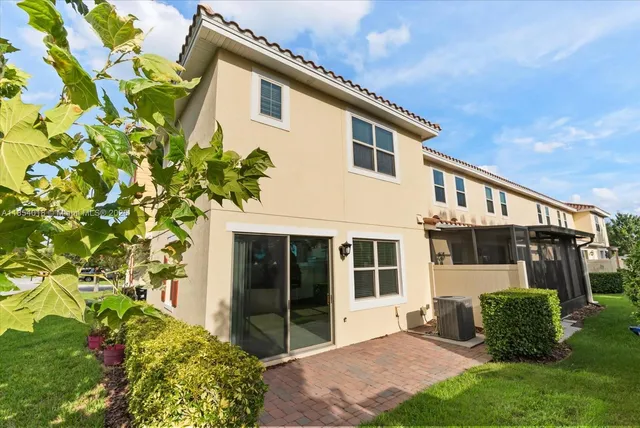 a view of backyard with trampoline