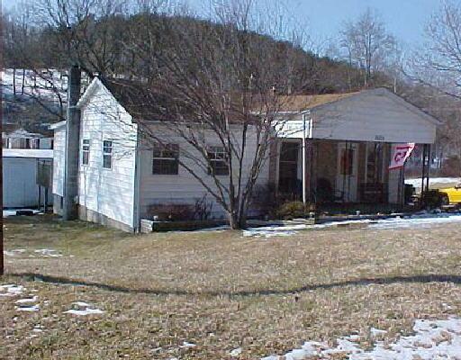 3503 Rutrough Road Southeast Roanoke, VA 24014 - Photo 1 of 1 a view of a house with a yard