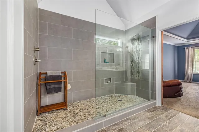 a bathroom with a sink and a shower