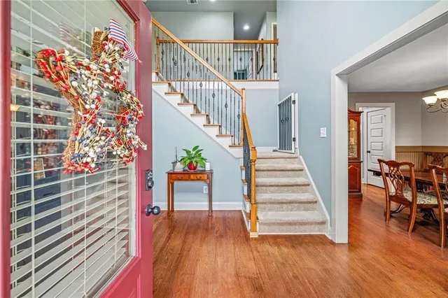 a view of entryway with wooden floor