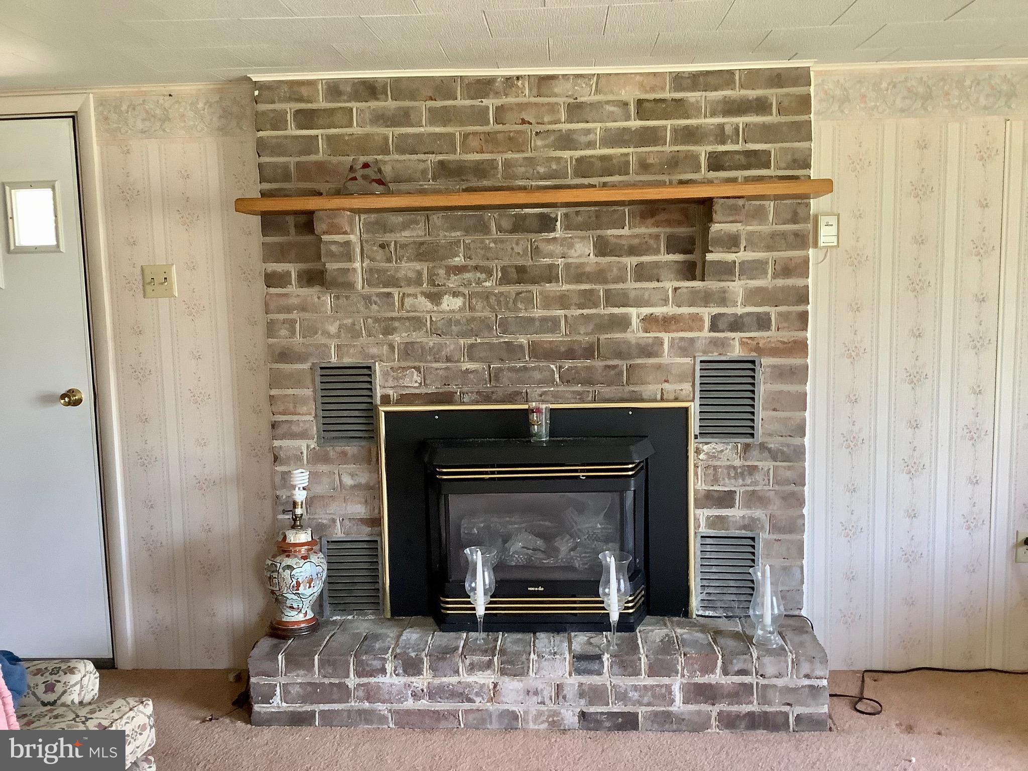 2410 Granite Station Road Gettysburg, PA 17325 - Photo 22 of 59 House 1 fireplace electric? Not used in many years