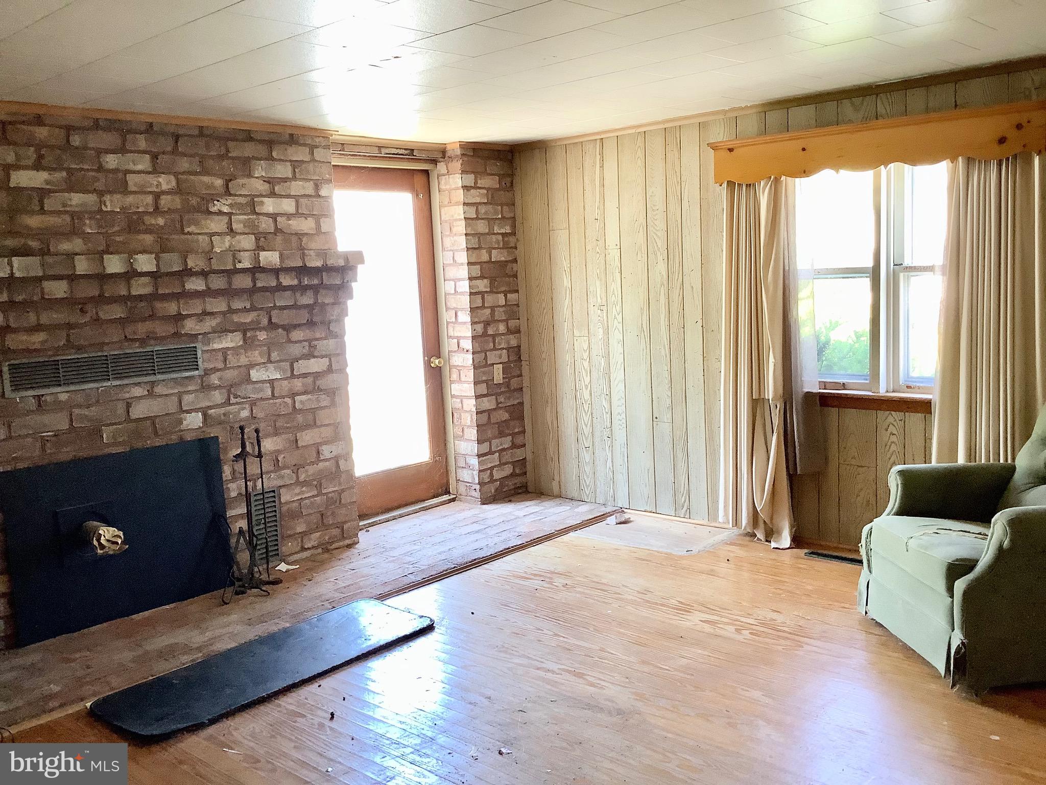 2410 Granite Station Road Gettysburg, PA 17325 - Photo 49 of 59 House 2 living room with pellet stove insert
