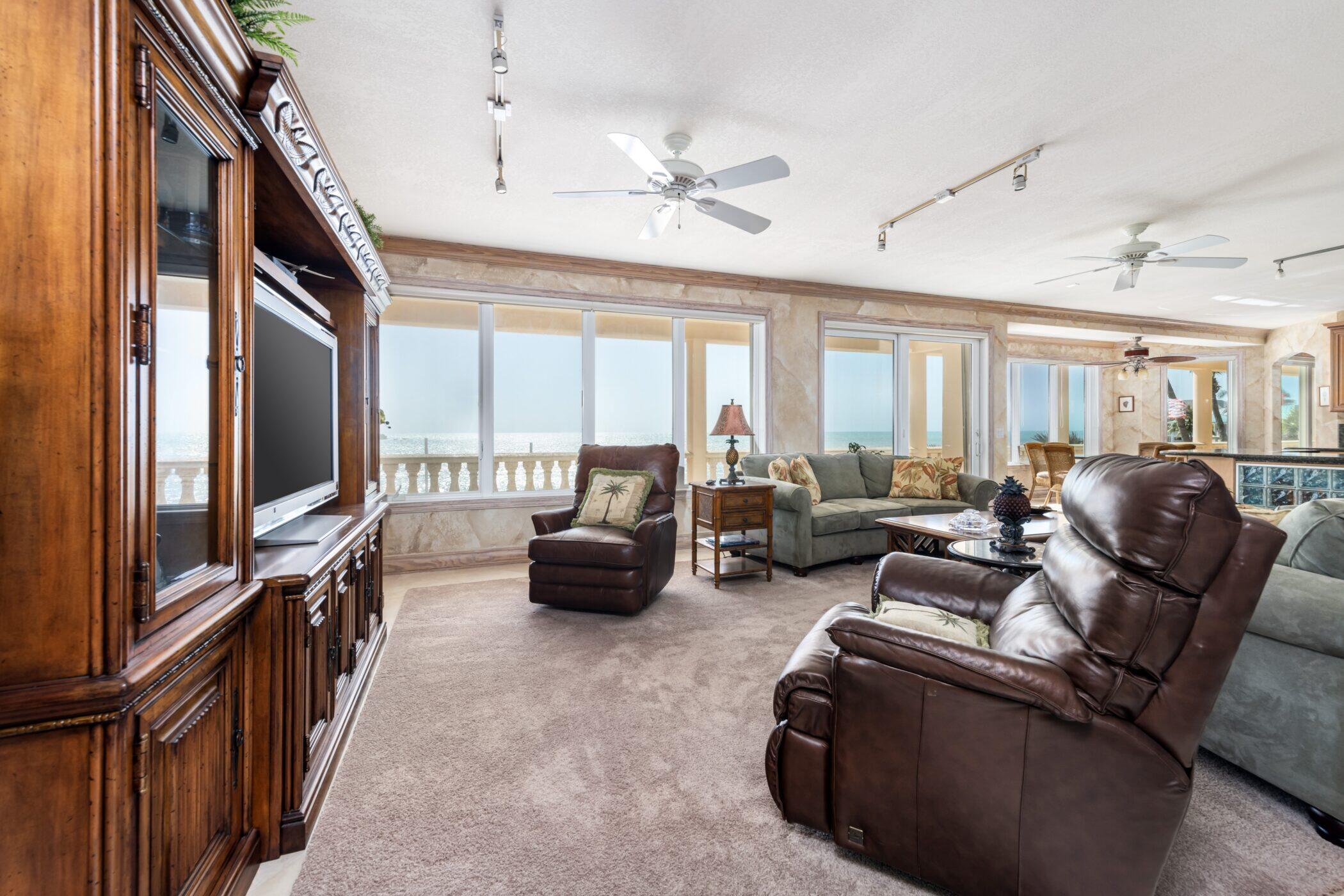 5 Ocean Drive East Marathon, FL 33050 - Photo 15 of 79 a living room with furniture and a flat screen tv