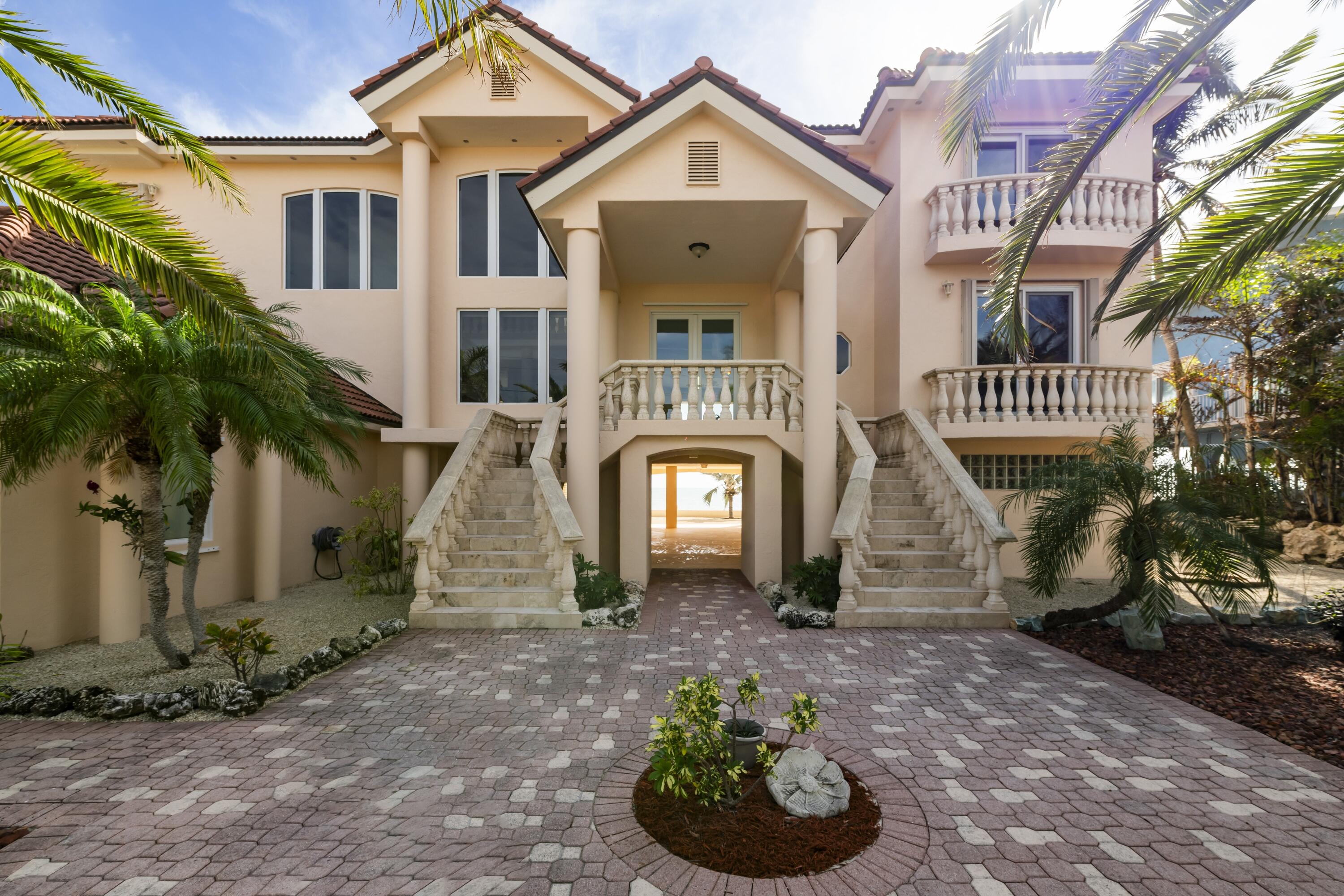 5 Ocean Drive East Marathon, FL 33050 - Photo 3 of 79 a front view of a house