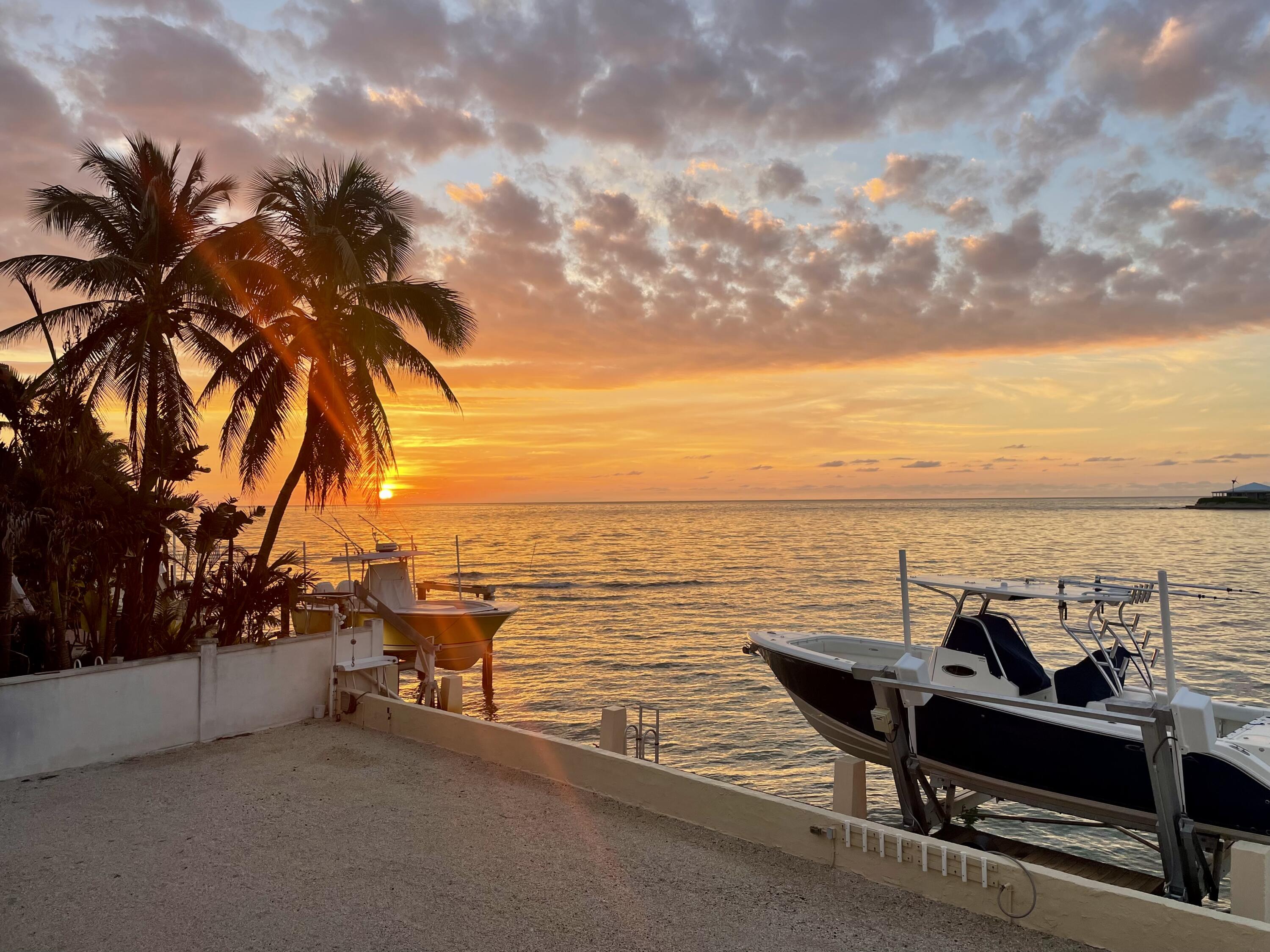 5 Ocean Drive East Marathon, FL 33050 - Photo 5 of 79 a view of a terrace with outdoor seating