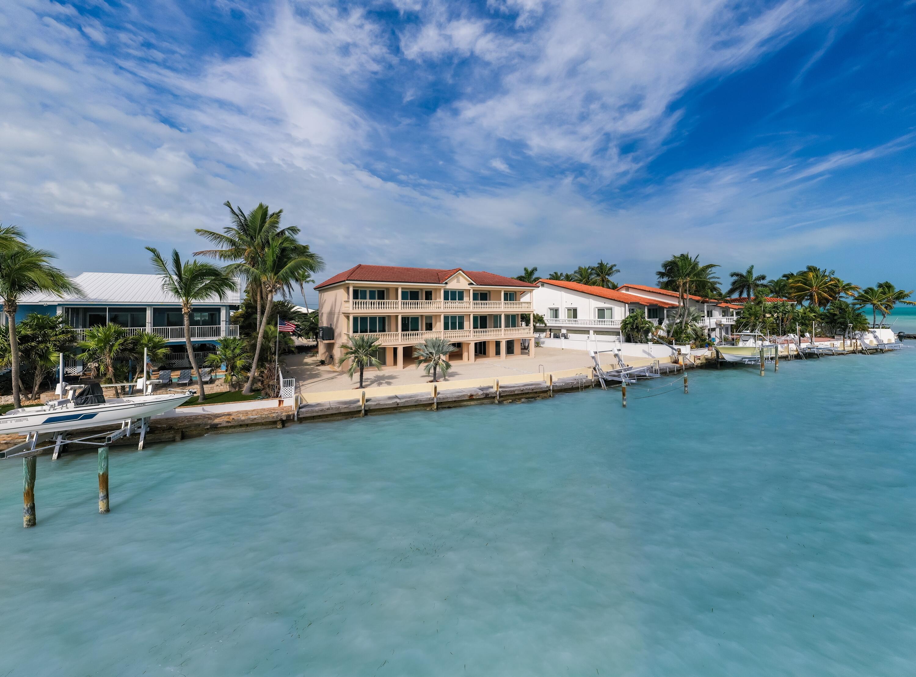 5 Ocean Drive East Marathon, FL 33050 - Photo 68 of 79 a view of a house with outdoor space and sitting area